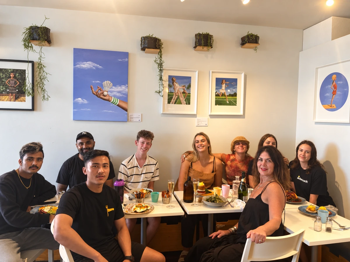 A group gathered for a meal inside Sidetrack cafe